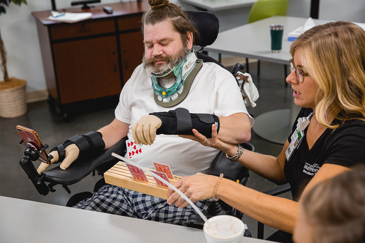 Euchre Brings Two Mary Free Bed Patients Together During Recreational