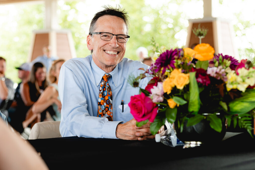 Dr. Jakubowski smiling at his retirement party from Mary Free Bed