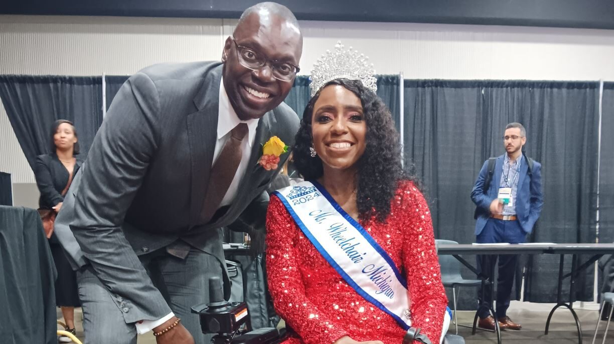 Ms Michigan posing for photo with Michigan elected officials