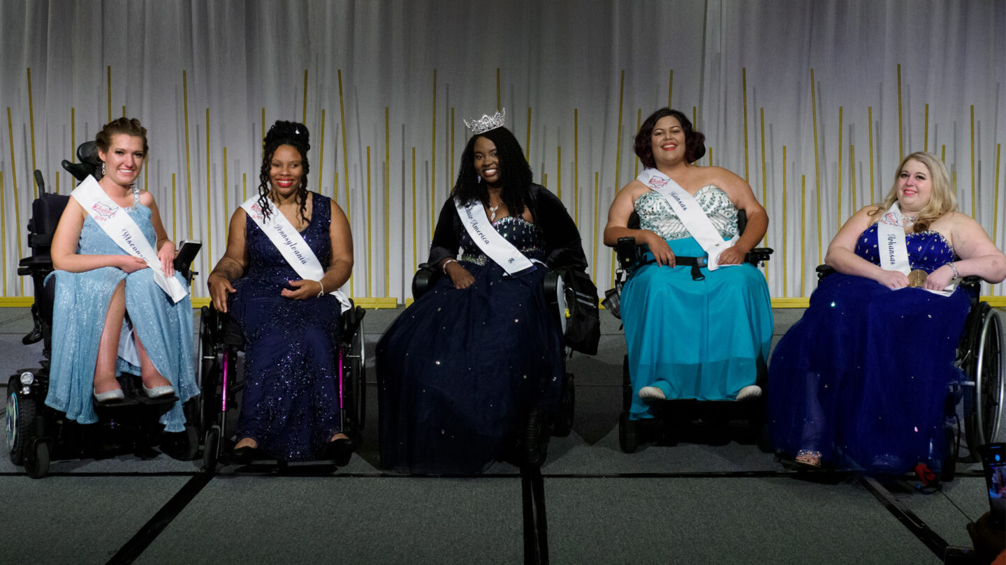 five women using wheelchairs who are in Ms Wheelchair America