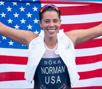 Paralympian Grace Norman holding the USA Flag