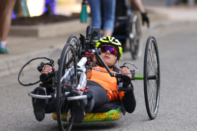 Handcyclist Kate Brim cycling at the Amway River Bank Run